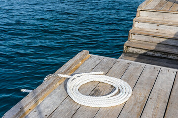 folded rope on the pier of an island resort in the Maldives