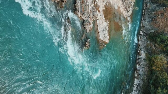 The Bolshaya Laba River. A mountain emerald river in a narrow, sunlit canyon. Bolshaya Laba River near the village of Psemen in Karachay-Cherkessia, Russia. Panoramic view. 4K