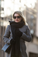 Portrait of a glamorous business woman in the street