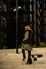 Portrait of a glamorous business woman in the street
