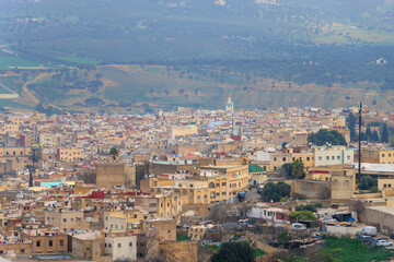 Fototapeta na wymiar Morocco, Fes - aerial view of the city and medina of Fez, including details.