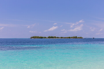 Azure water in the lagoon of the tropical island in the Maldives