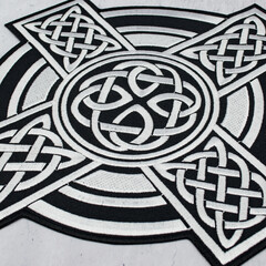 Embroidered patch with the image of celtic cross. Accessory for rockers, bikers, metalheads and punks. Occult symbolism.