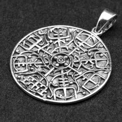 Silver pendant. Helmet of horror. Runic compass, futhark, runes, ravens and wolves of one. Viking style. Nordic tradition. Amulet. Valknut. Asatru Valhalla and Asgard.