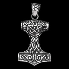 Silver Mjolnir pendant. Peruns ax. Pagan Style. Ancient amulet of Vikings and Slavs. A symbol of strength and power. Protection from evil spirits. Skull, ram's head. Kolovrat. Asatru.