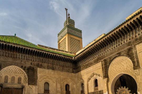 FES, MOROCCO. The minaret view and Inside interior of The Madrasa Bou Inania.