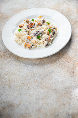 rice seafood risotto fresh eating cooking appetizer meal food snack on the table copy space food background rustic top view Pescetarian diet