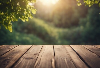 Naklejka na ściany i meble Empty wooden table top with blurred nature background Calm sunny day evening in nature with view to forest