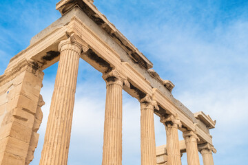 Fototapeta premium Porch of Caryatids statues at Erechtheion temple, Acropolis of Athens, Greece. Erechtheum is an ancient Greek Ionic temple of Athena Polias in Greece. Popular travel destination