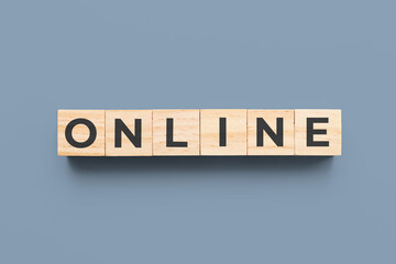 online wooden cubes on blue background
