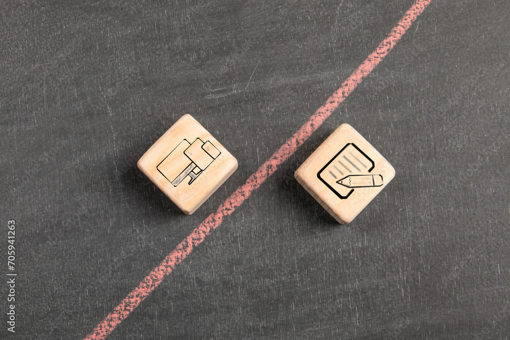 Sticker digitization concept. wooden blocks on a dark chalkboard background