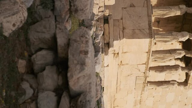 Caryatids statues at Erechtheion temple in Acropolis of Athens, Greece. Erechtheum is an ancient Greek Ionic temple in Greece. Vertical orientation