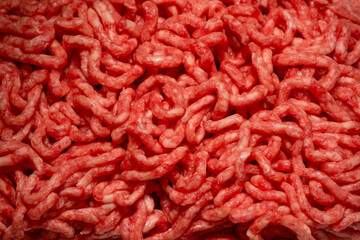 Raw minced beef close-up, top view.