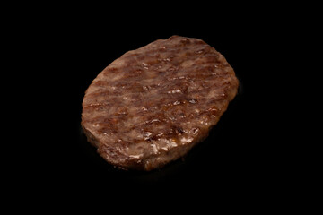 Cutlet with minced beef isolated on  black background.