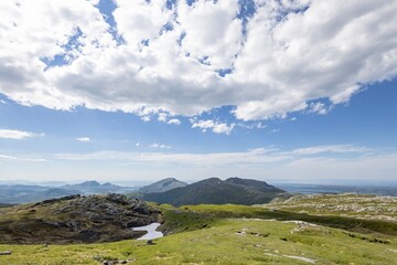 Fototapeta premium Hiker in the mountains,Brønnøy,Helgeland,Norway