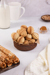 homemade cakes and milk on the table in the house in the early morning