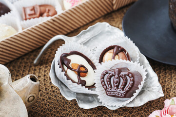 Handmade candies in the form of a crown close-up on the table. Festive still life of handmade chocolate
