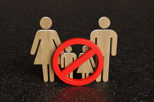Wooden board cutout of a family having a red forbidden sign on children. Illustration of the concept of child-free restaurants and childless millennial couples