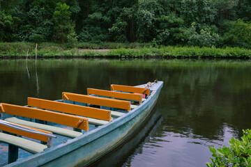 Tourist river boat transport sightseeing wildlife boat waterfront Trinidad Tobago