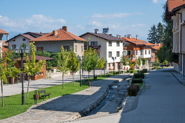 Typical street and buildings at old town of Bansko, Bulgaria - obrazy, fototapety, plakaty