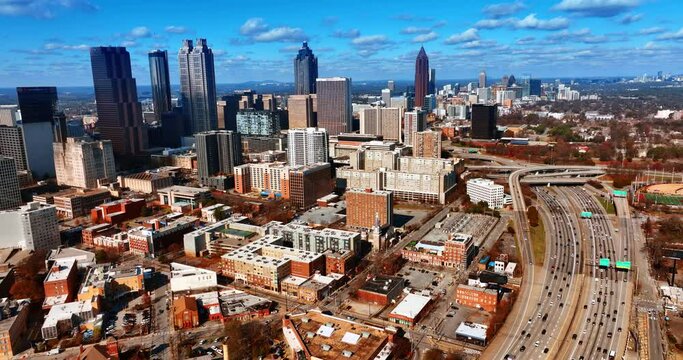 Urban landscape of modern American city downtown. Daytime scenery of Atlanta, Georgia, USA from aerial perspective.