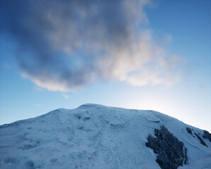 Snowy mountain under a sunny sky with some clouds.