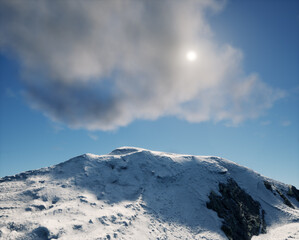 Snowy mountain under a sunny sky with some clouds.
