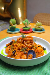 Seafood Spaghetti with Tiger Prawns, Scallops, Mussels, Calamari, Salmon and Tomato Sauce