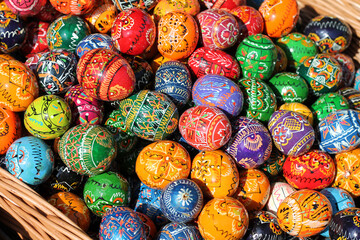  Traditional Czech easter eggs for sale at a market. Hand painted Easter eggs at a basket.  © flycatdesign