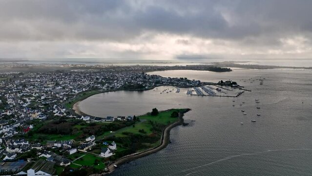 A peaceful sail in Lorient's industrial waters.