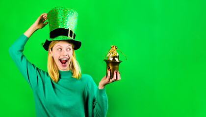 Patricks Day. Irish tradition. Pot with money for Patrick's day party. Happy blonde woman in...