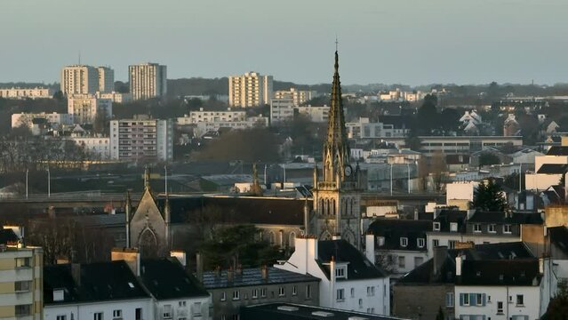 Lorient's silhouette against a dusk-lit sky.