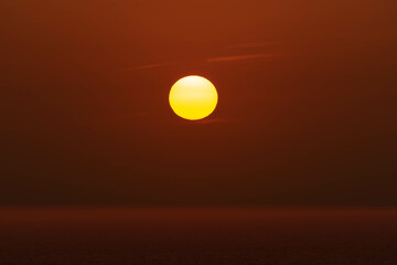 Sunset with sea view and sun in the background on Cartagena beach, Colombia.
​