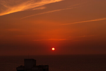 Sunset with sea view and sun in the background on Cartagena beach, Colombia.
​
