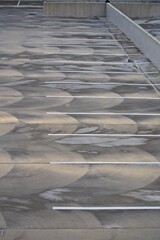 parking lot with lines and concrete texture swirls