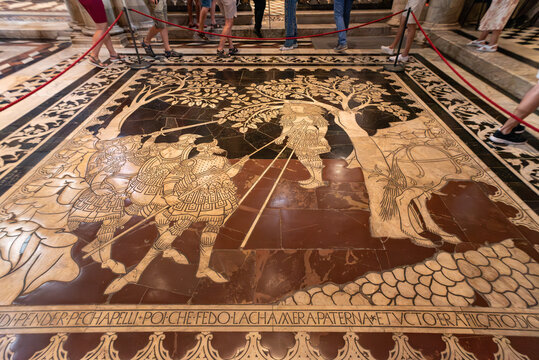 SIENA, ITALY - SEPTEMBER 23, 2023 - Unique marble inlays on the floor of the Siena cathedral