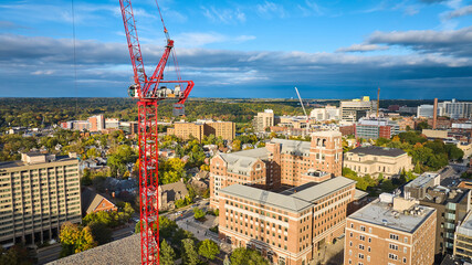 Aerial View of Red Construction Crane in Urban Landscape, Ann Arbor