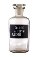 Transparent medical vial with atropine on a white background.