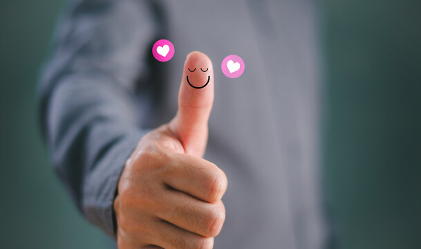Customer experience concept. Thumb up happy smile face compliment, good feedback rating positive customer review, mine satisfaction survey, mental health assessment, feeling good mental health day .