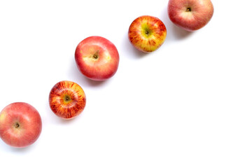Variety of fresh apples on white background.