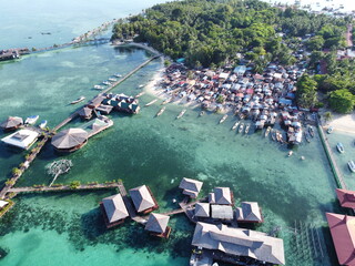 Drone view of Mabul Island, the base for diving in Sipadan Island, Sabah state in Malaysia.
