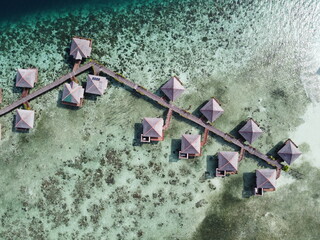 Drone view of Mabul Island, the base for diving in Sipadan Island, Sabah state in Malaysia.