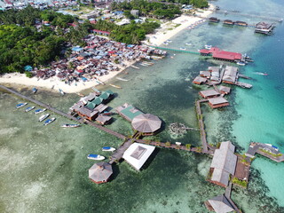 Drone view of Mabul Island, the base for diving in Sipadan Island, Sabah state in Malaysia.