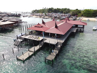 Drone view of Mabul Island, the base for diving in Sipadan Island, Sabah state in Malaysia.