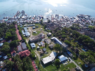 Drone view of Mabul Island, the base for diving in Sipadan Island, Sabah state in Malaysia.