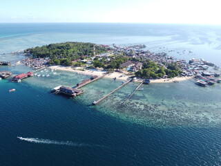 Drone view of Mabul Island, the base for diving in Sipadan Island, Sabah state in Malaysia.
