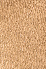 Beige imitation artificial leather texture background. Abstract