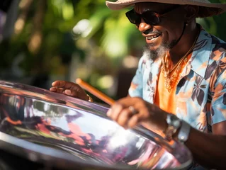 Fotobehang A steel drum player in , Caribbean © Tisha