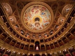 Obraz premium Budapest, Hungary - December 7, 2023: interior wide angle view of the Hungarian State Opera Magyar Állami Operaház architecture.