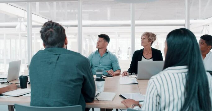 Strategy, planning and meeting with business people in office for brainstorming, idea and workshop. Report, project management and teamwork with group of employees in boardroom for discussion